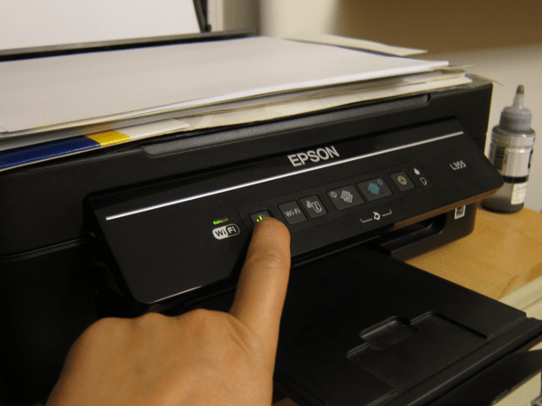 Press and hold the FEED button when the printer is OFF
